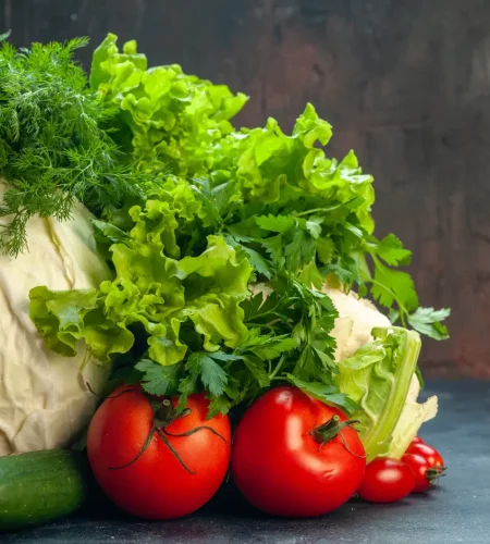 front-view-fresh-vegetables-cabbage-parsley-bell-peppers-lettuce-dill-cauliflower-tomatoes-cucumber-dark-surface